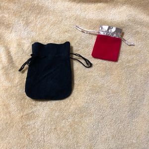 2 velvet jewelry sacks (1 red/gold & 1 black)